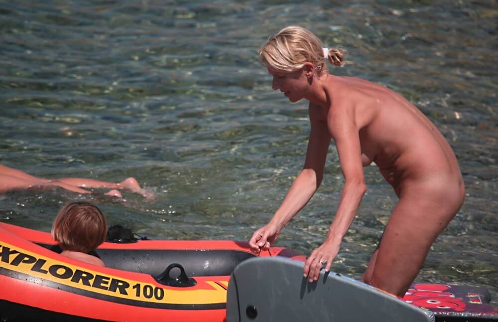 Red Boating for Two Nudists pics - It strives for inner balance—not being afraid to be naked among those like you