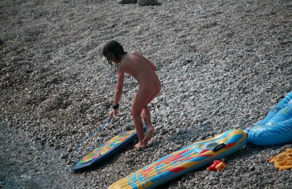 Naturist Surf Board Glides pics - Naturism is about respecting natural beauty