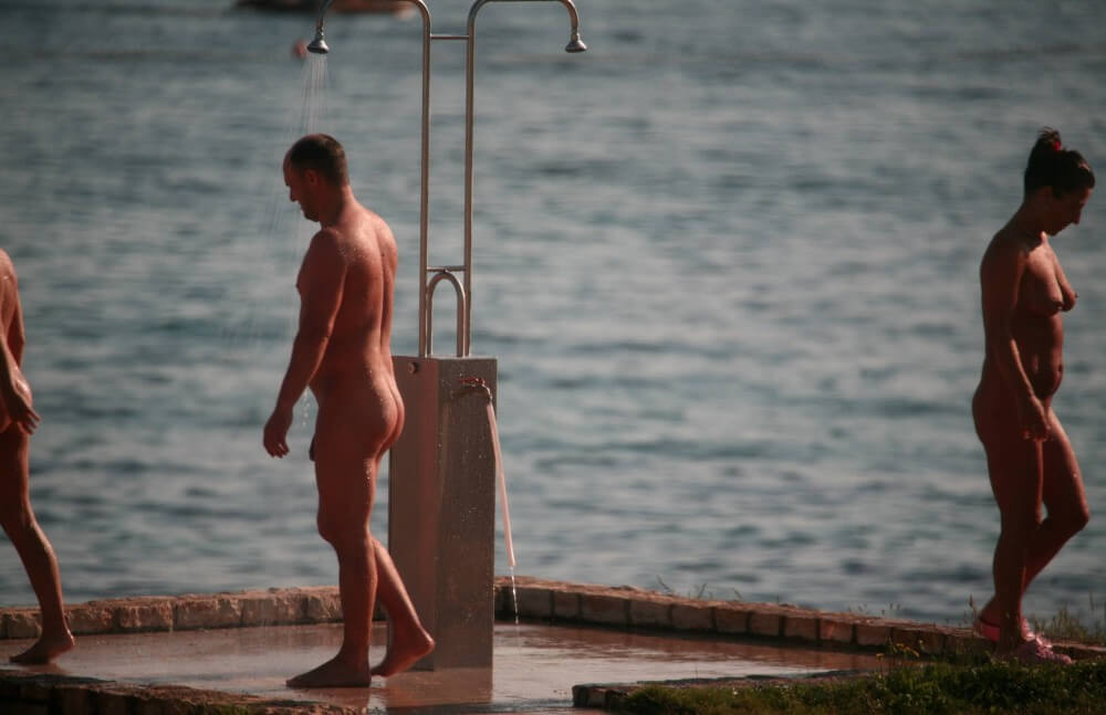 Naturist Shower at Dusk pics - The practice of naturism fosters an atmosphere of trust and respect