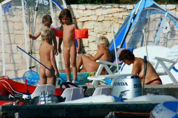 By the boat photos - Nudism and naturism are closer to natural harmony