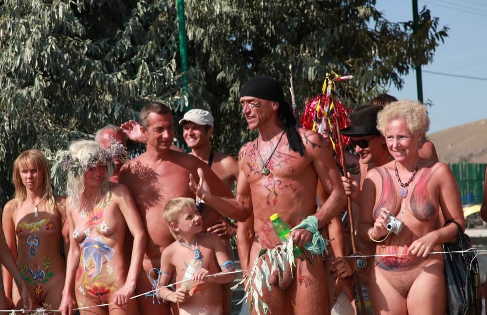 Naturist Day From Behind pics - Nudists relax beautifully—a sight to behold