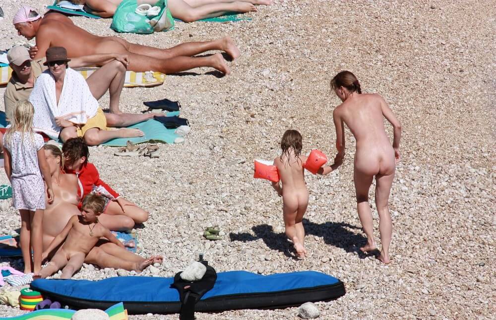 Orange Floaty Safety First Naturist pics - Ethical Principles of the Nudist Community